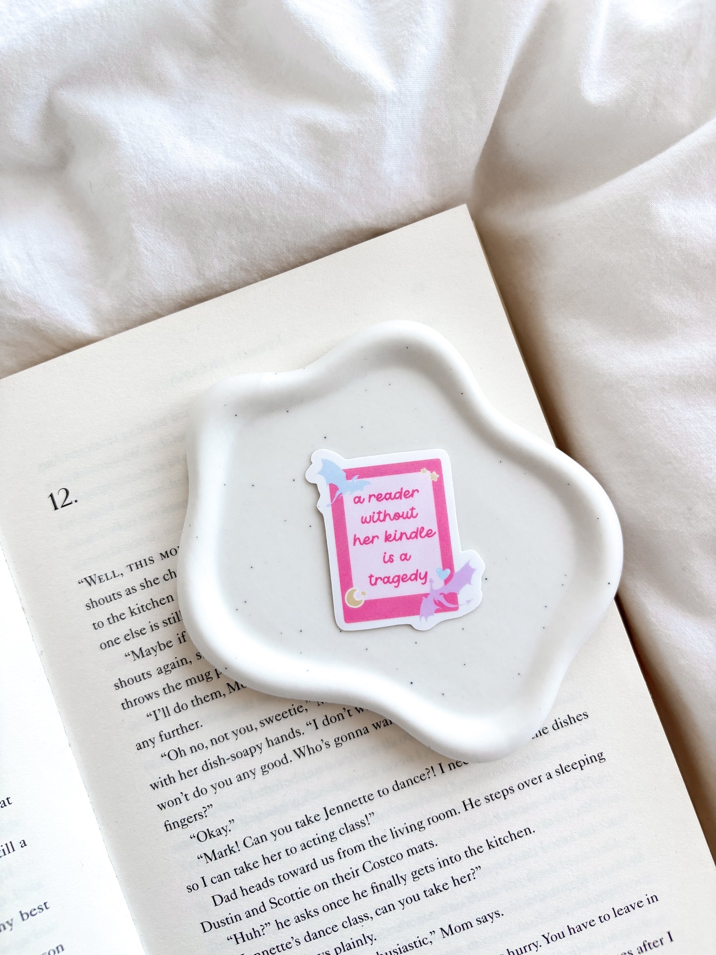 A Reader Without Her Kindle Is A Tragedy Sticker